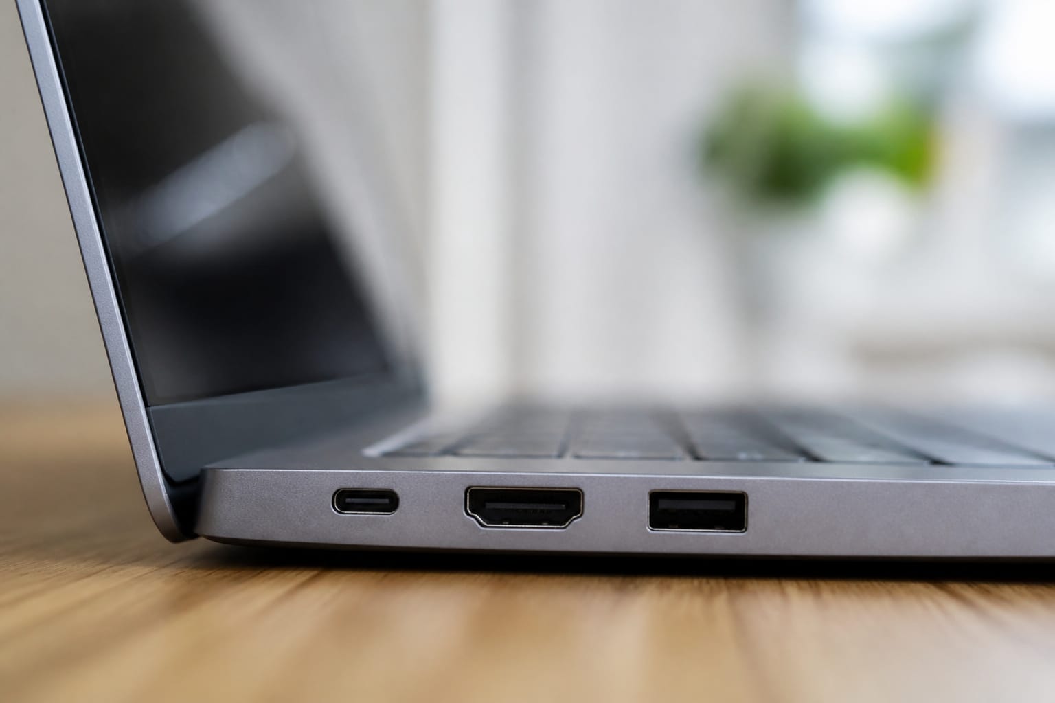 The side of a laptop showing USB-C, HDMI and USB-A ports