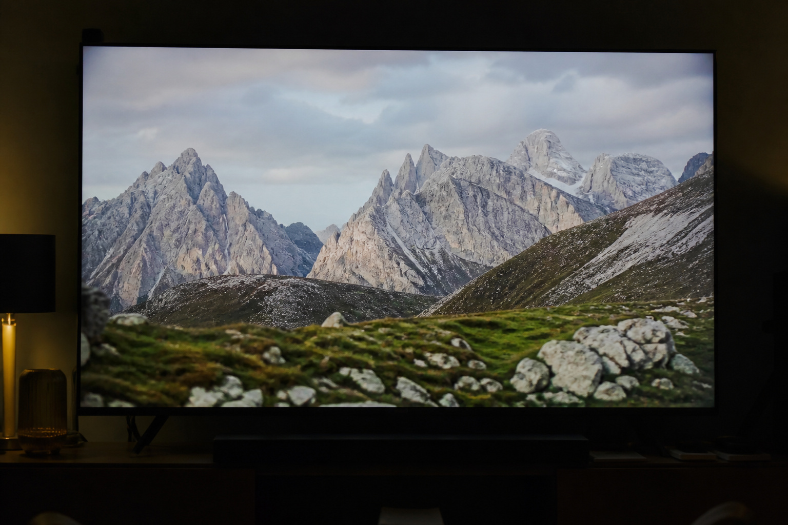 TV showing a slow cinematic pan across a mountain landscape