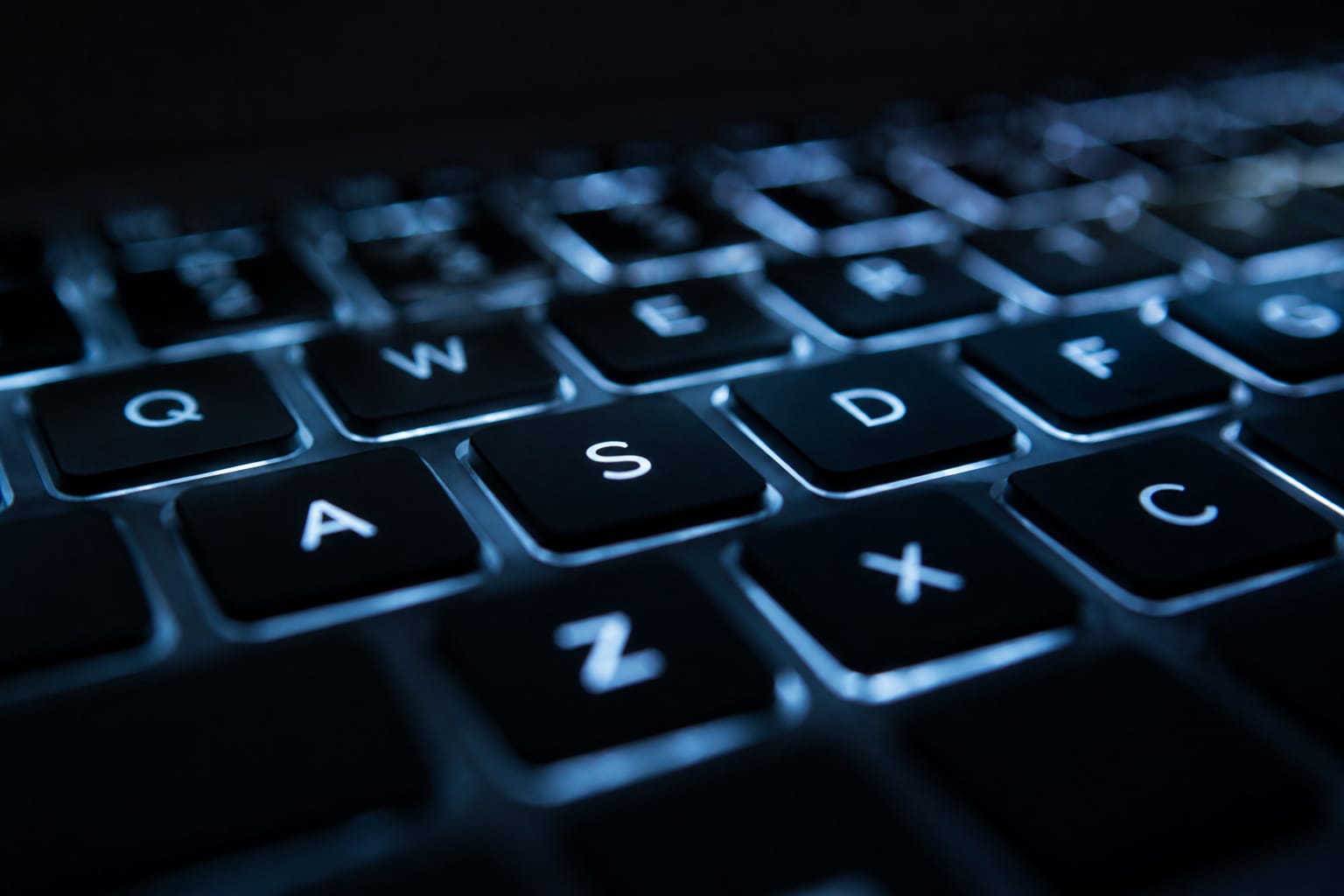 Backlit large print keyboard in a dim room