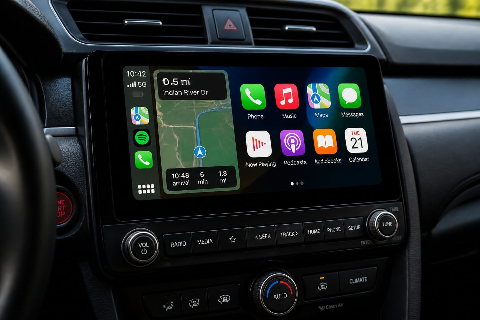 Touchscreen car stereo displaying a smartphone-mirroring home screen