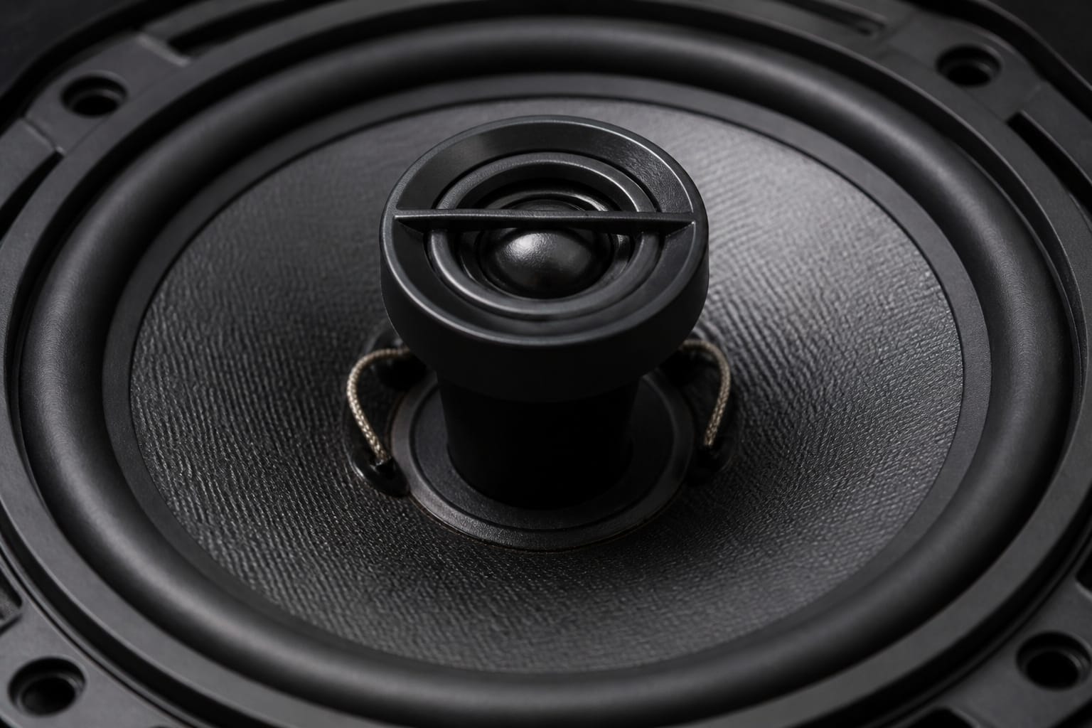 Coaxial car speaker with built-in tweeter mounted on top of the woofer