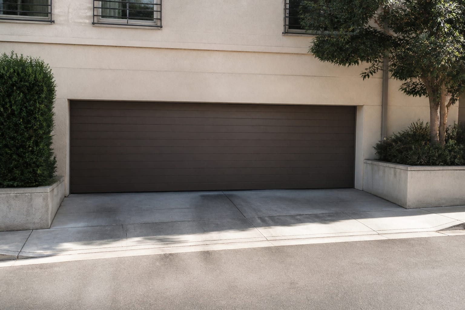 Closed apartment building garage door in daylight