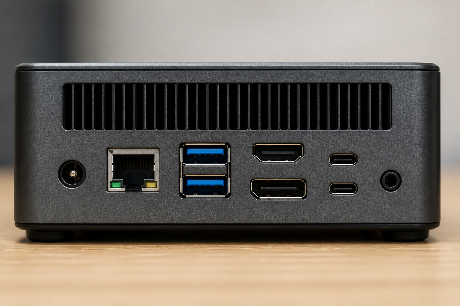 Back panel of a mini PC showing several ports